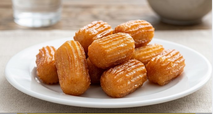 Turske Tulumbe: Recept za savršeno prženo slatko testo u sirupu